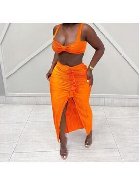 Serving bold baddie energy in this 🔥 vibrant orange two-piece set!